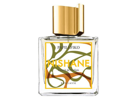 Perfume bottle with gold cap and colorful label on a white background