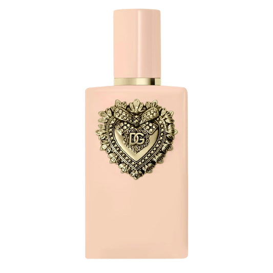 Pink perfume bottle with decorative heart emblem on a white background