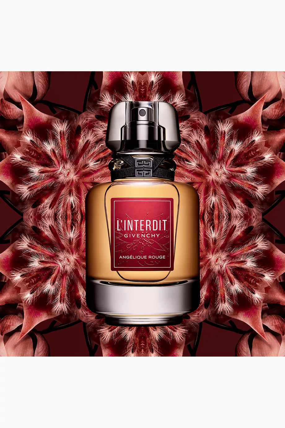 Givenchy L'Interdit perfume bottle on a red floral background