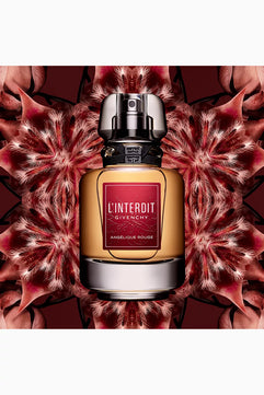 Givenchy L'Interdit perfume bottle on a red floral background