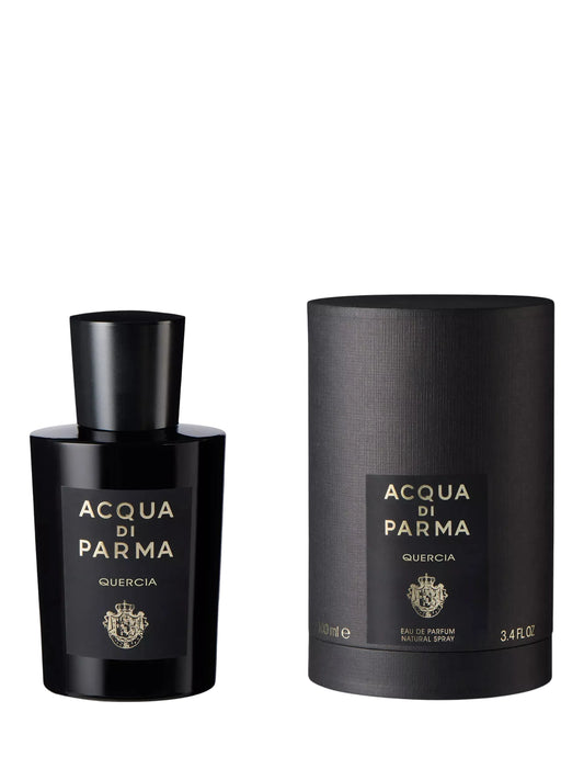 Acqua di Parma perfume bottle and packaging on a light gray background