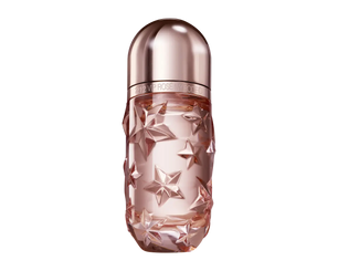 Perfume bottle with star design on a white background