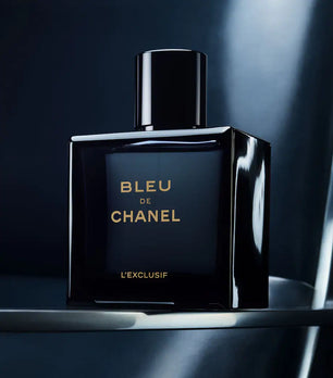 Bleu de Chanel perfume bottle on a dark background