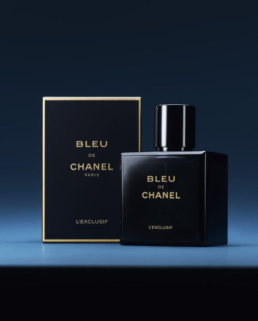 Bleu de Chanel perfume bottle and packaging on a gradient background