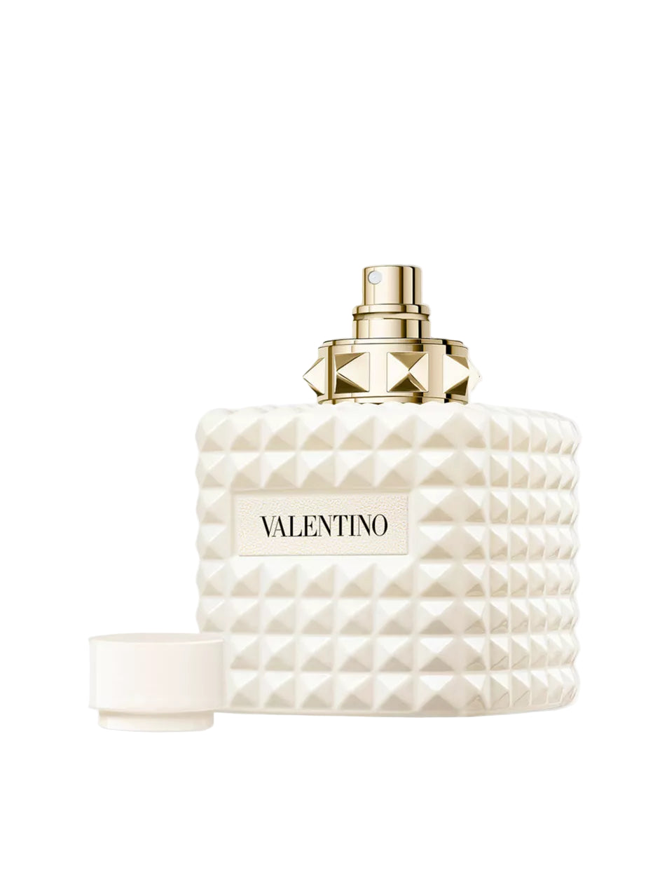 Valentino perfume bottle with geometric design on a white background