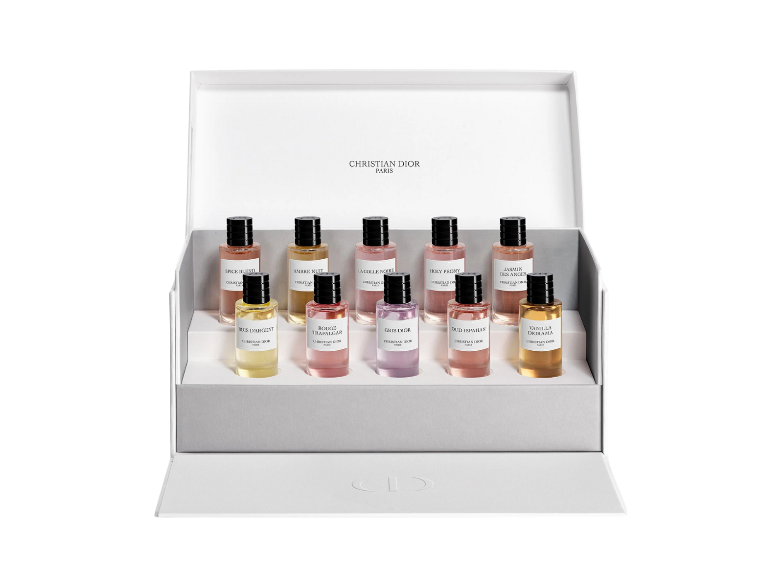 Set of Christian Dior perfume bottles in a display box on a white background