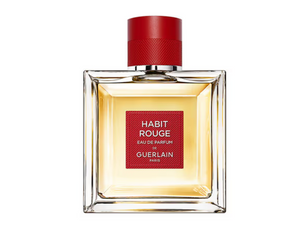 Guerlain Habit Rouge perfume bottle with red cap on a white background
