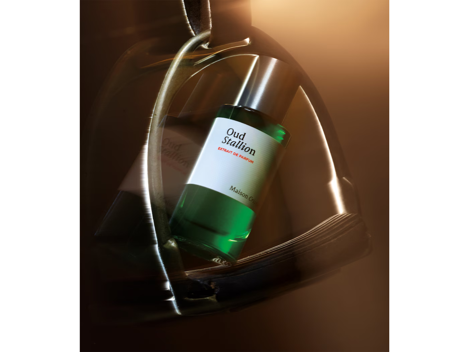 Green bottle with label inside a metallic container