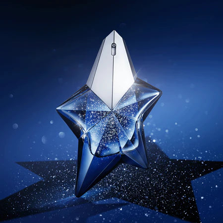 Star-shaped perfume bottle on a dark blue background