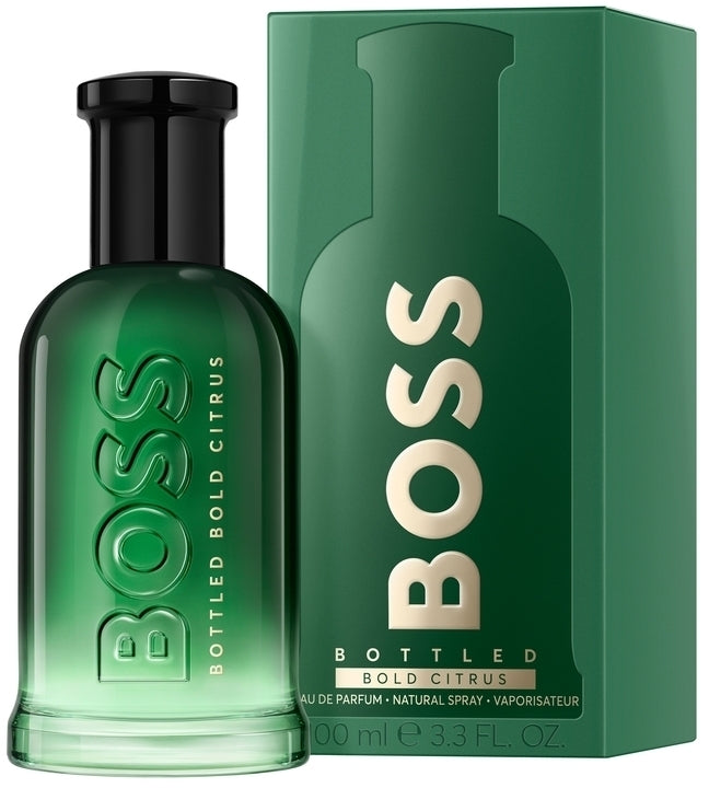 Green BOSS bottled perfume with packaging on a white background
