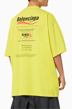 Balenciaga Dry Cleaning - Large Fit T-shirt من جيرسي عضوي عتيق باللون الأصفر